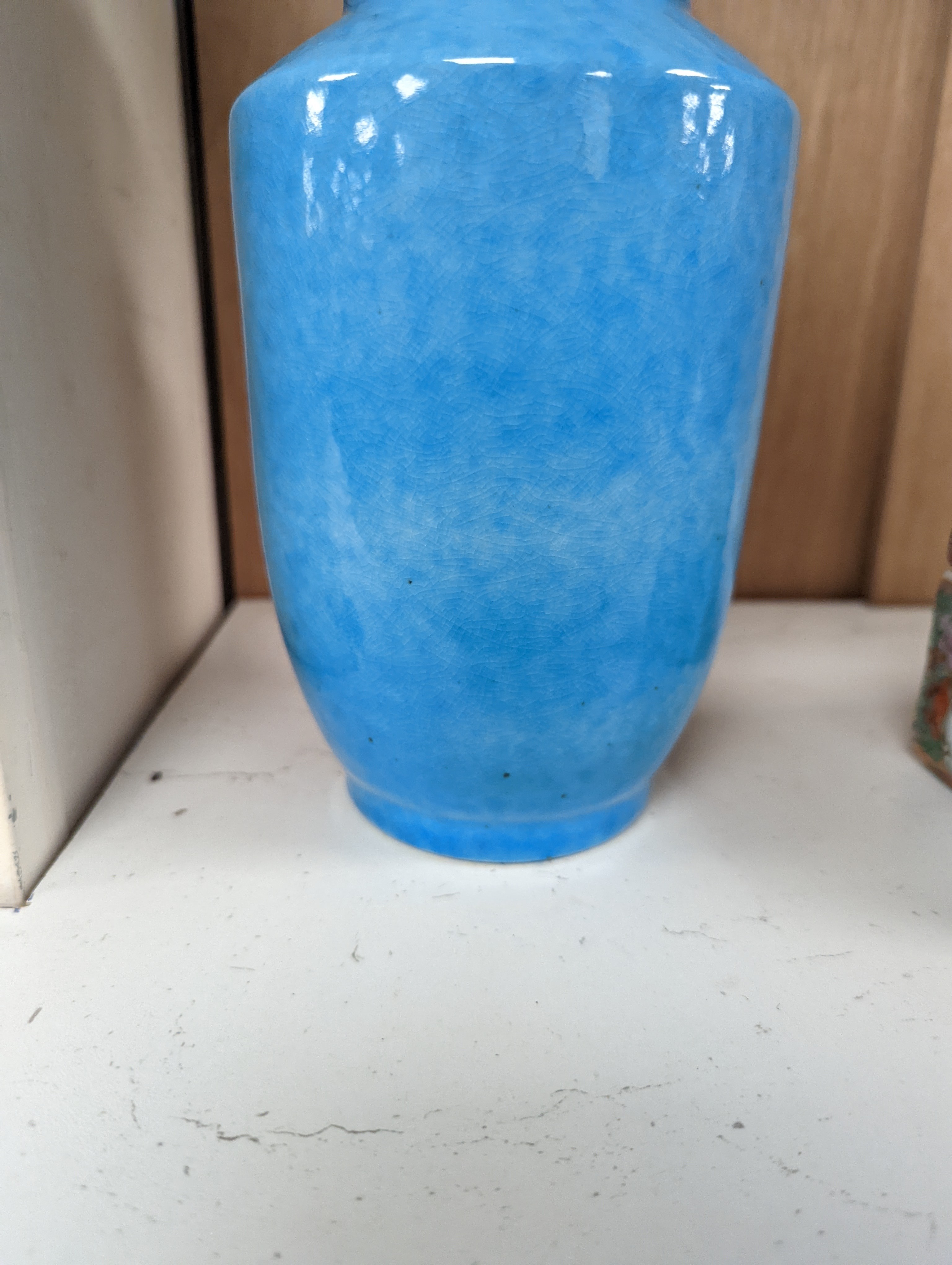 A Chinese turquoise glazed vase 22cm, with a fine crackle to the exterior glaze